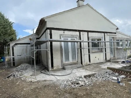 Dégagement et reprise des fondations, chantier 2, réalisation antérieure du dirigeant