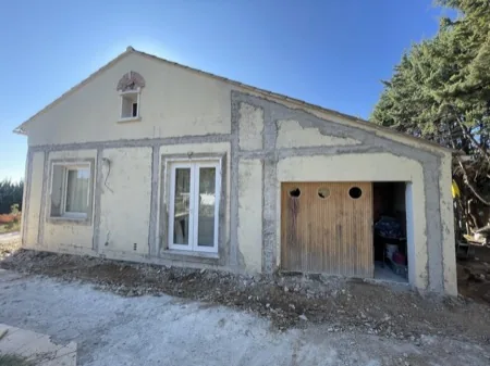 Dégagement et reprise des fondations, chantier 8, réalisation antérieure du dirigeant