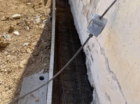 Dégagement et reprise des fondations, chantier 10, réalisation antérieure du dirigeant