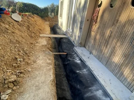 Chaînages, drainage et finitions, chantier 12, réalisation antérieure du dirigeant